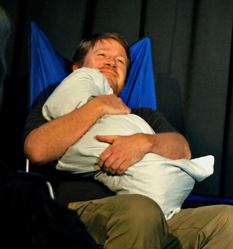 Smiler_holding_his_pillow