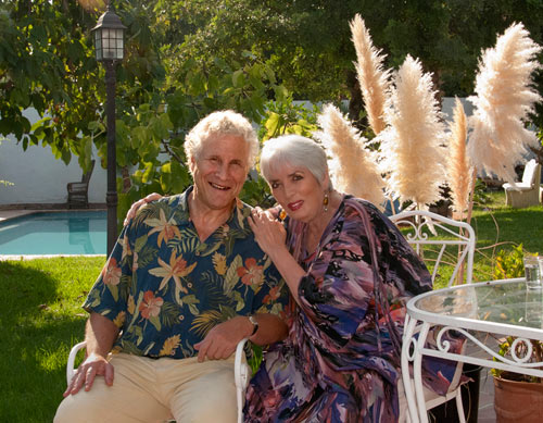 1.philip-and-xie-with-feathers-in-garden